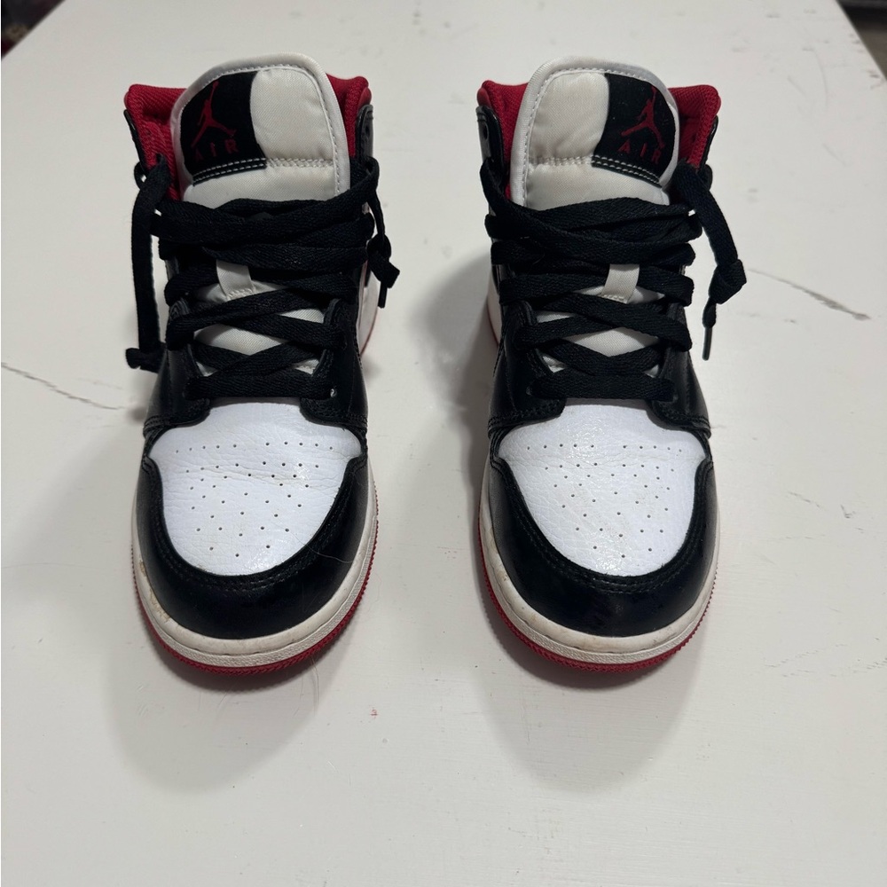 Nike Jordan Kids Black, White, and Red Sneakers
